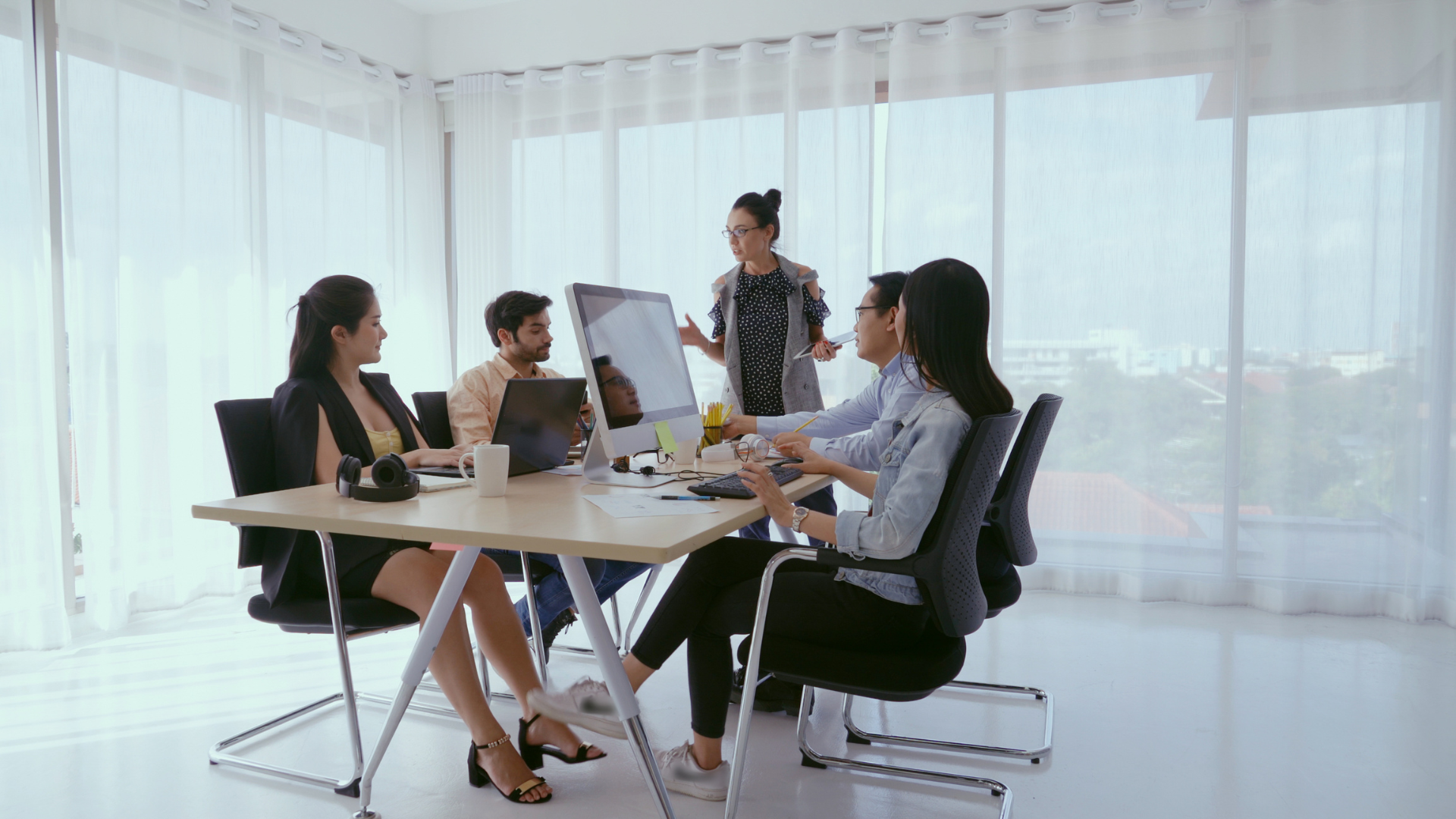 a group of people discussing a marketing plan