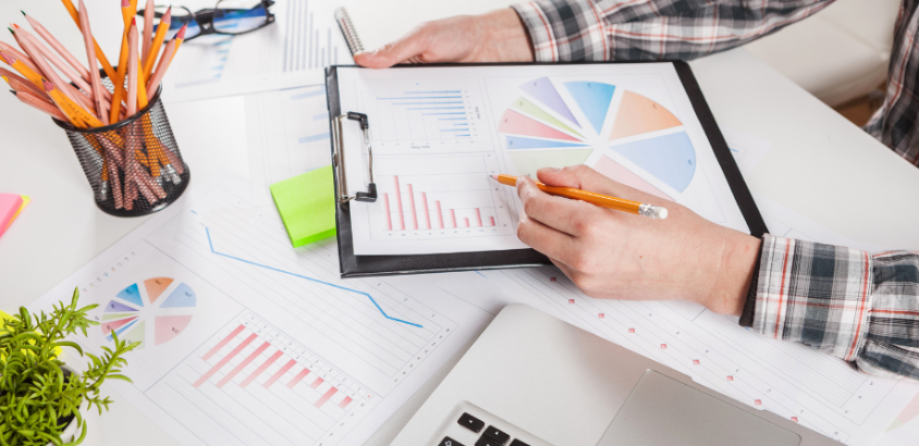 Charts and data on a desk