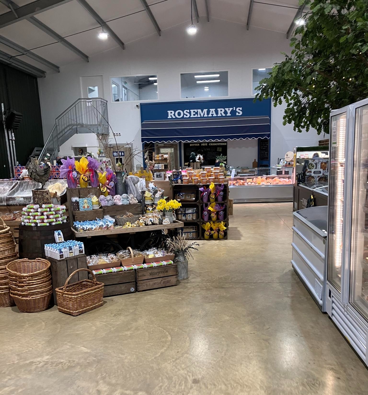 A selection of local farm products for sale in the interior of the farm shop.