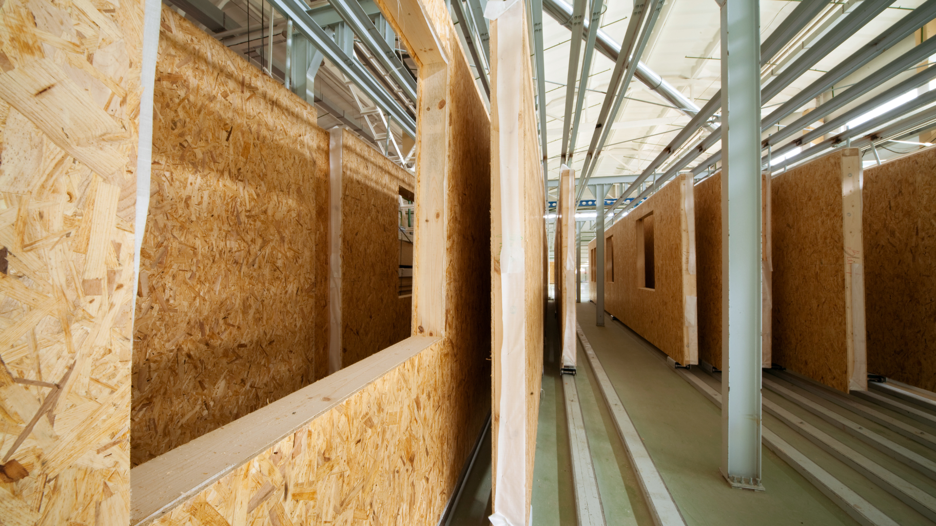 rows of modular sections of buildings in a storage area