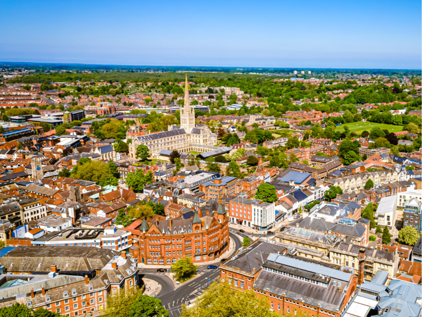 An aerial shot of Norwich, showing the cathedral and Prince of Wales Road