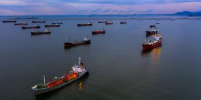 A fleet of oil transport ships in the ocean