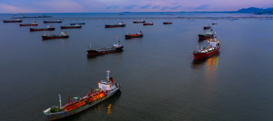 A fleet of oil transport ships in the ocean