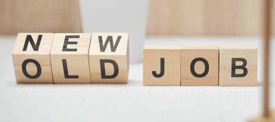 An image of wooden letter blocks. The three blocks on the left are halfway through changing from OLD to NEW, and the three blocks on the right spell the word JOB