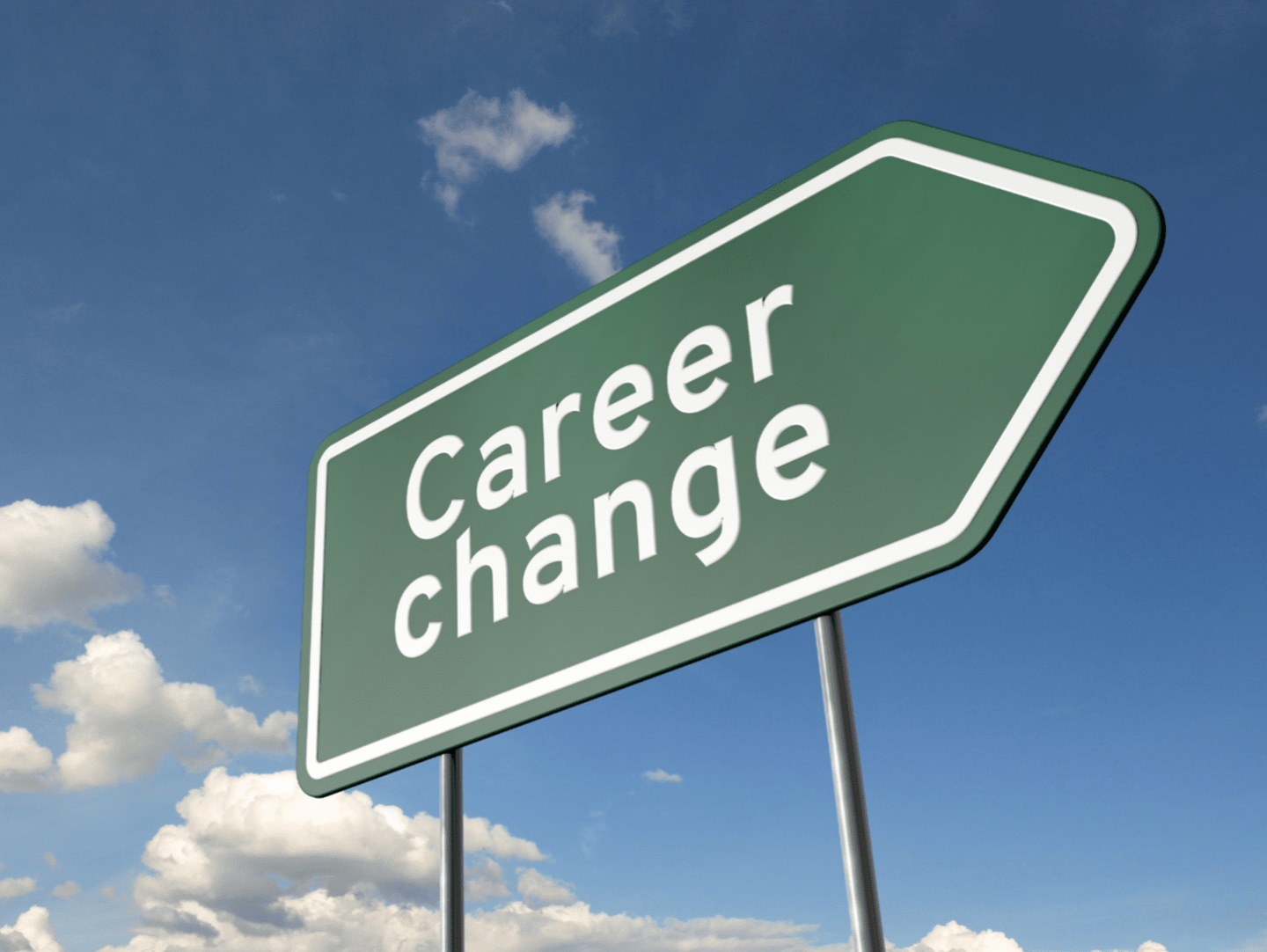 An image of a green road sign against a blue sky. The sigh has white lettering saying the words "Career Change"