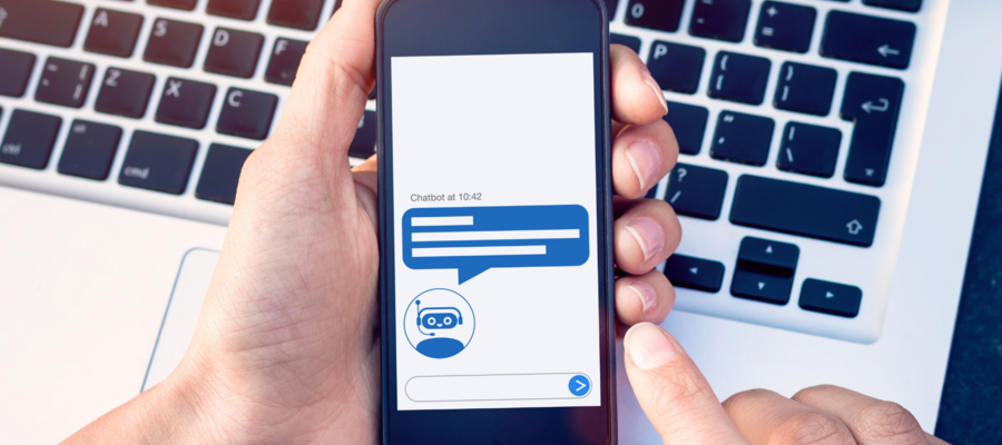 An image of a person using an AI customer service chatbot on a smartphone